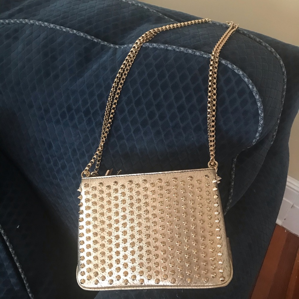 Christian Louboutin gold purse